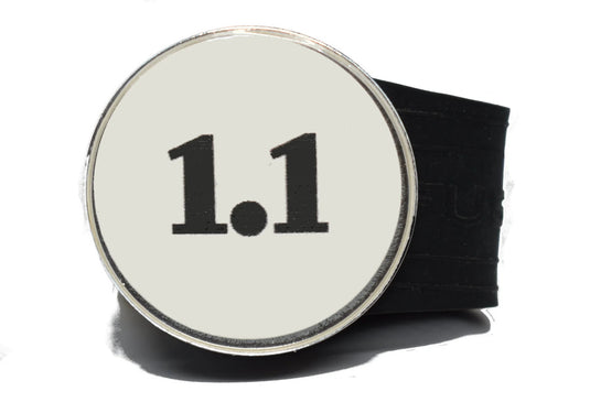USGA Golf Rule 1.1 Ball Marker (White coin) on a Black InfusenClip™