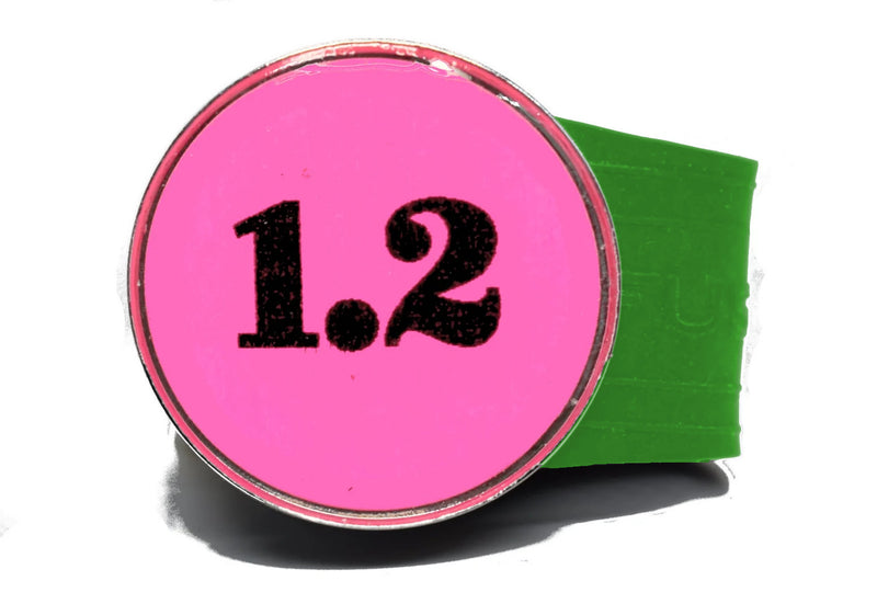 Load image into Gallery viewer, USGA Golf Rule 1.2 Ball Marker (Pink coin) on a Green InfusenClip™
