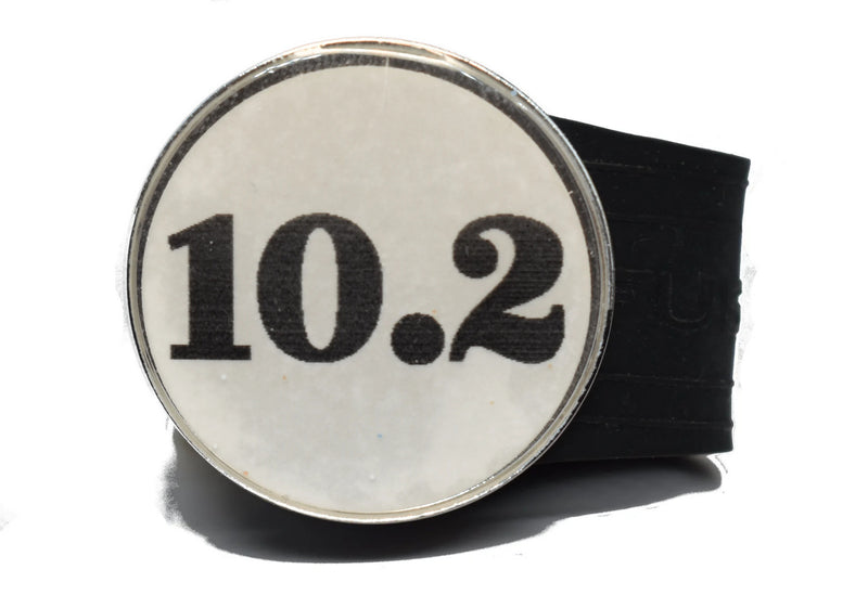 Load image into Gallery viewer, USGA Golf Rule 10.2 Ball Marker (White coin) on a Black InfusenClip™
