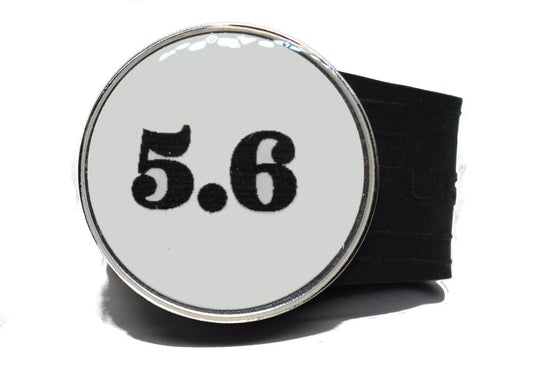 USGA Golf Rule 5.6 Ball Marker (White coin) on a Black InfusenClip™