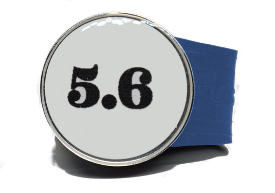 USGA Golf Rule 5.6 Ball Marker (White coin) on a Blue InfusenClip™