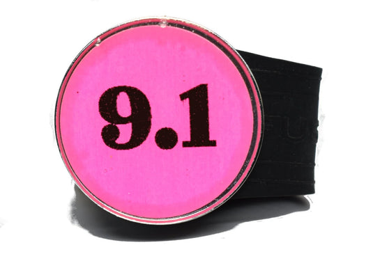 USGA Golf Rule 9.1 Ball Marker (Pink coin) on a Black InfusenClip™