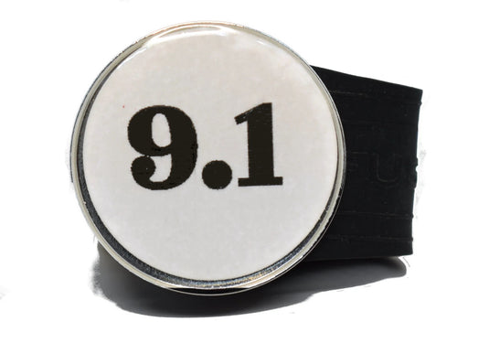 USGA Golf Rule 9.1 Ball Marker (White coin) on a Black InfusenClip™