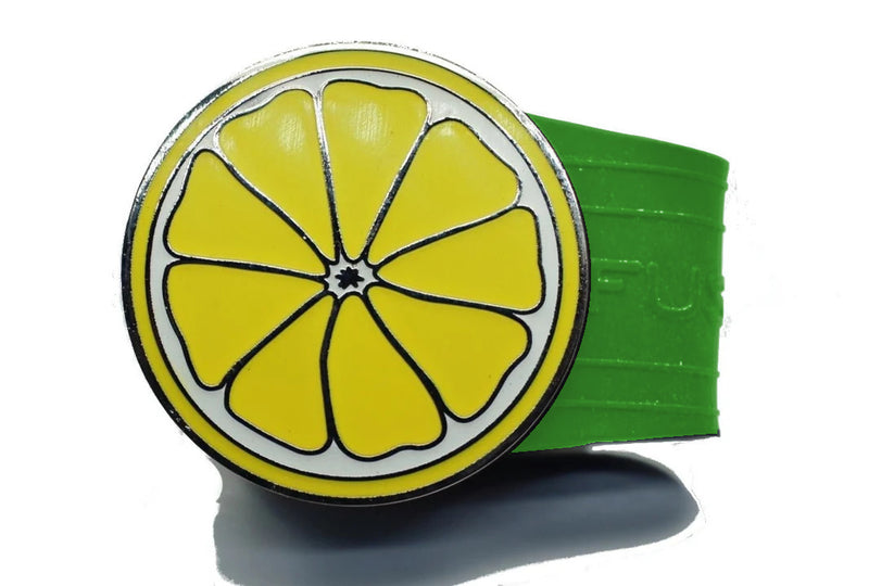 Load image into Gallery viewer, Lemon golf ball marker on a Green InfusenClip™
