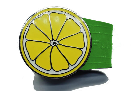 Lemon golf ball marker on a Green InfusenClip™