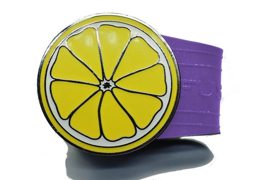 Lemon golf ball marker on a Purple InfusenClip™