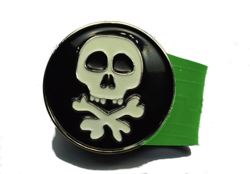 Load image into Gallery viewer, Glow in the dark Skull and Cross Bones golf ball marker on a Green InfusenClip™
