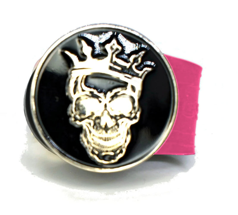 Load image into Gallery viewer, Skull with Crown golf ball marker on a Pink InfusenClip™
